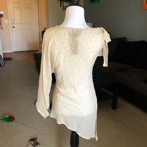 One sleeved tunic